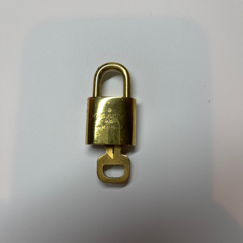 Louis Vuitton Lock and key.